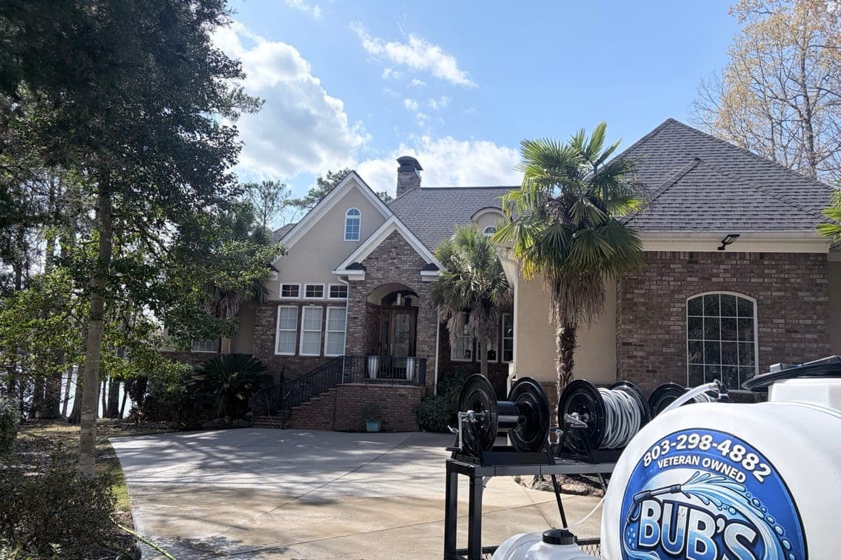 Bub's Pressure Washing trailer and equipment at a South Carolina home